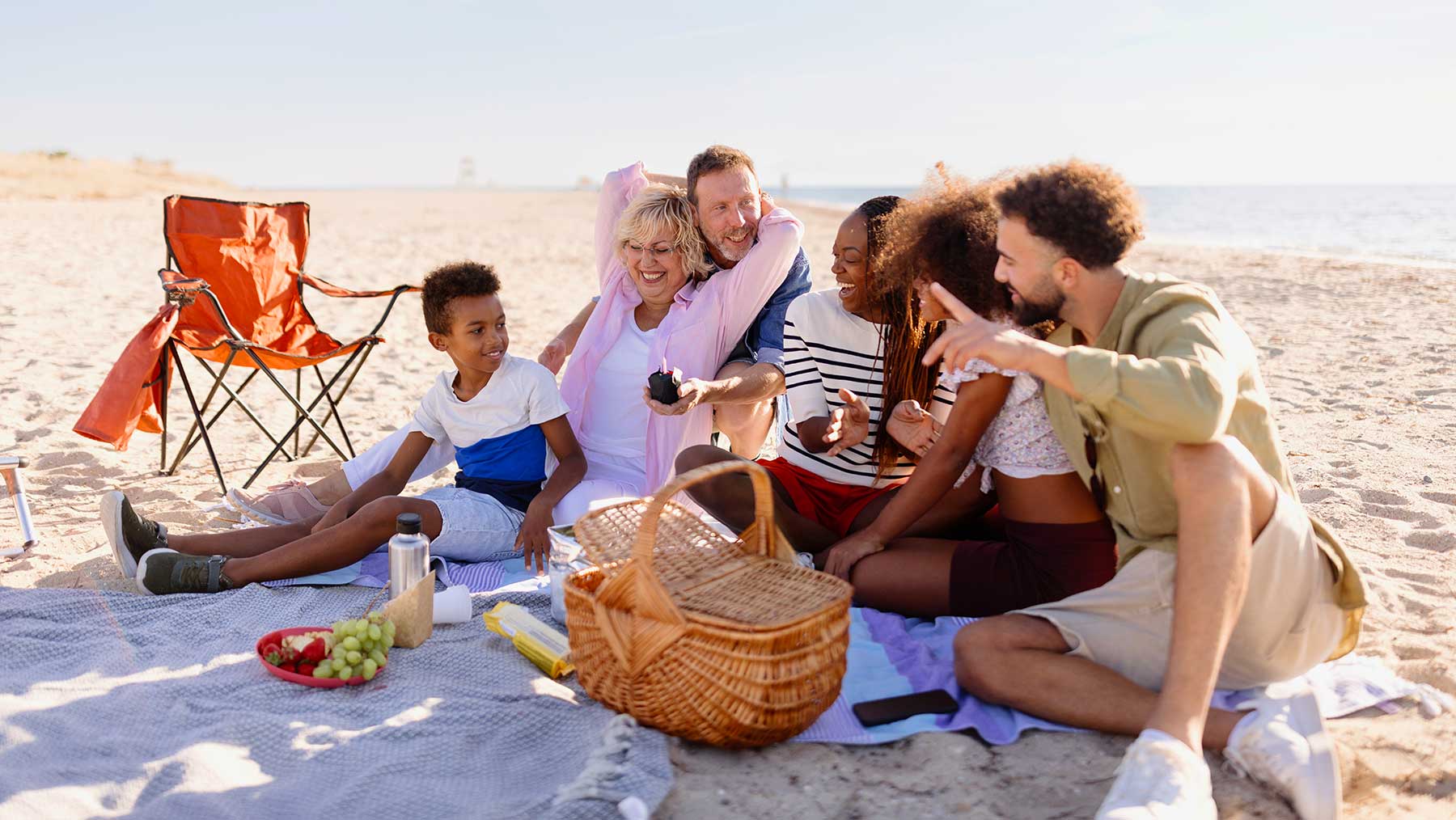 Family enjoying time together on the beach.